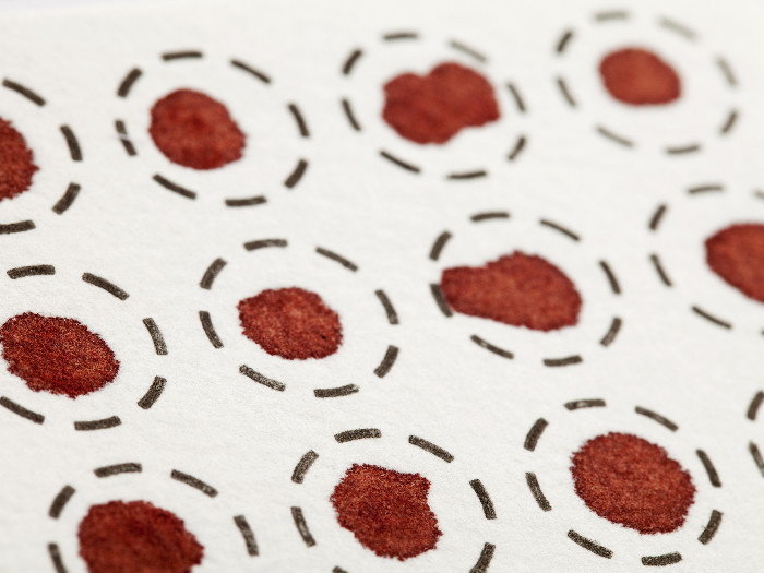 self test - blood spots on a white fiber filter for laboratory analysis